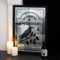 Old raven Apothecary mirrored wall art