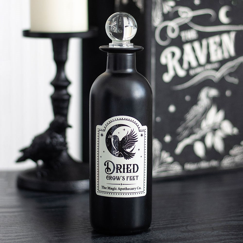 Dried crows feet decorative glass potion bottle