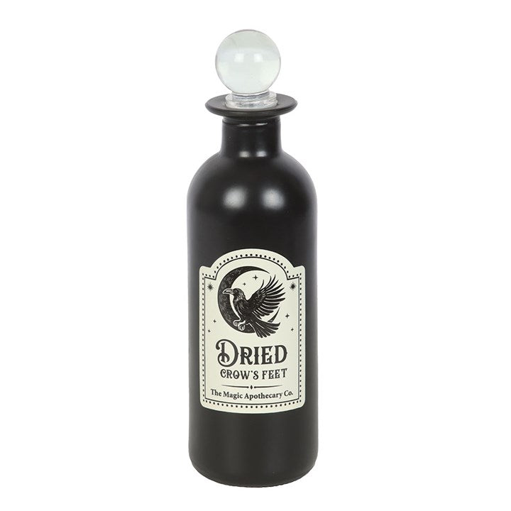 Dried crows feet decorative glass potion bottle